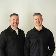 Brian and Greg in black shirts